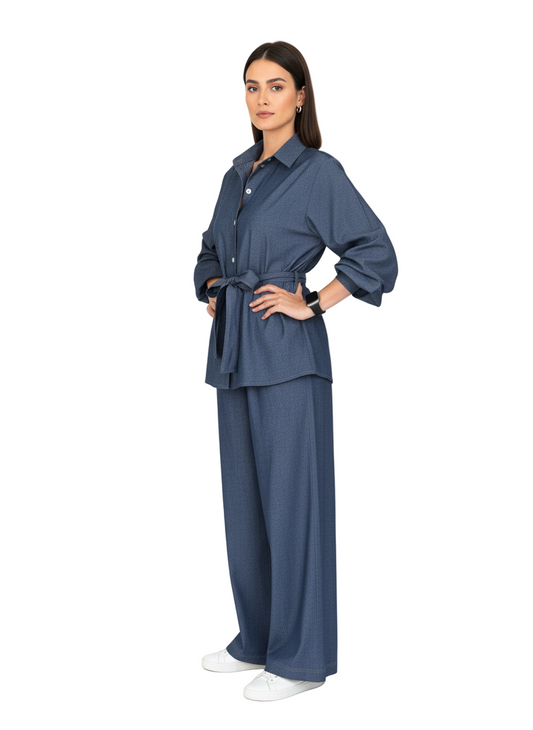 Woman wearing a blue outfit on a white background