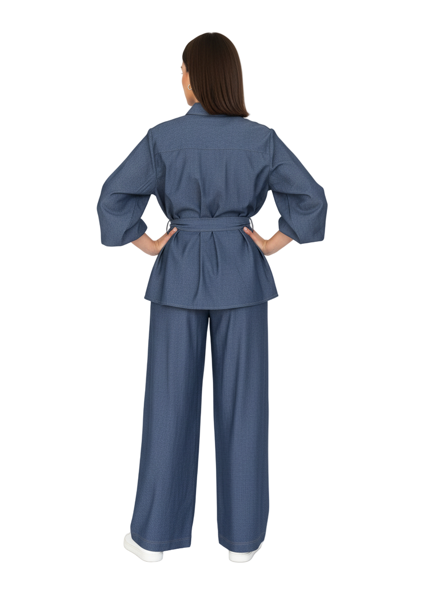 Woman wearing a blue outfit with wide-leg pants on a white background