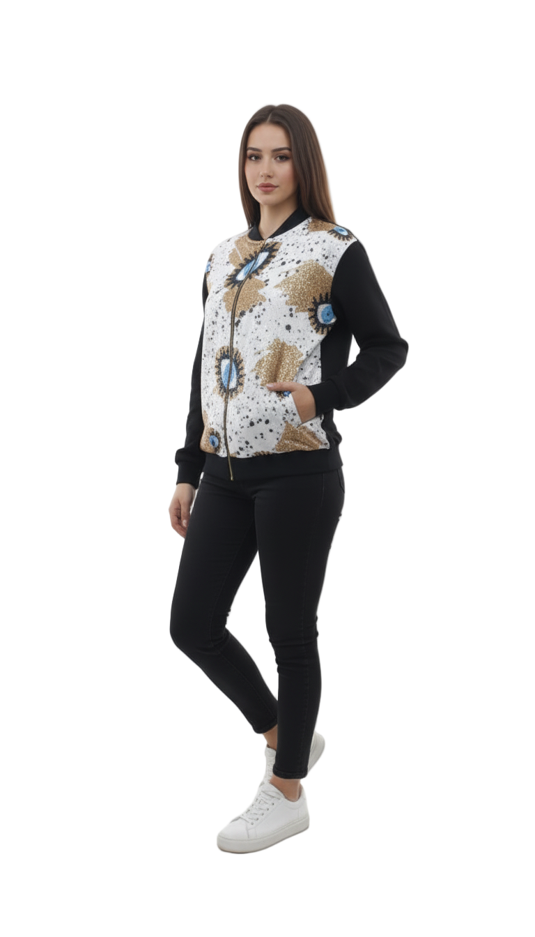 Woman wearing a patterned jacket and black pants on a white background