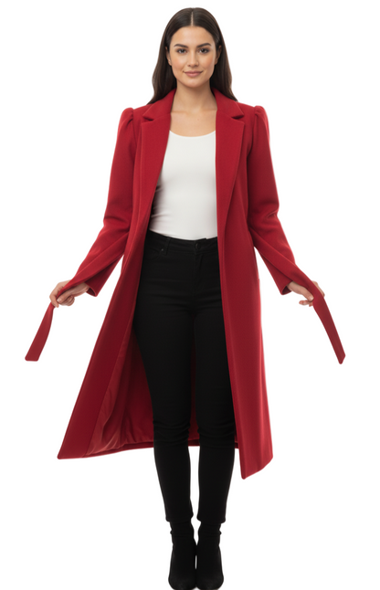 Woman wearing a red coat on a white background