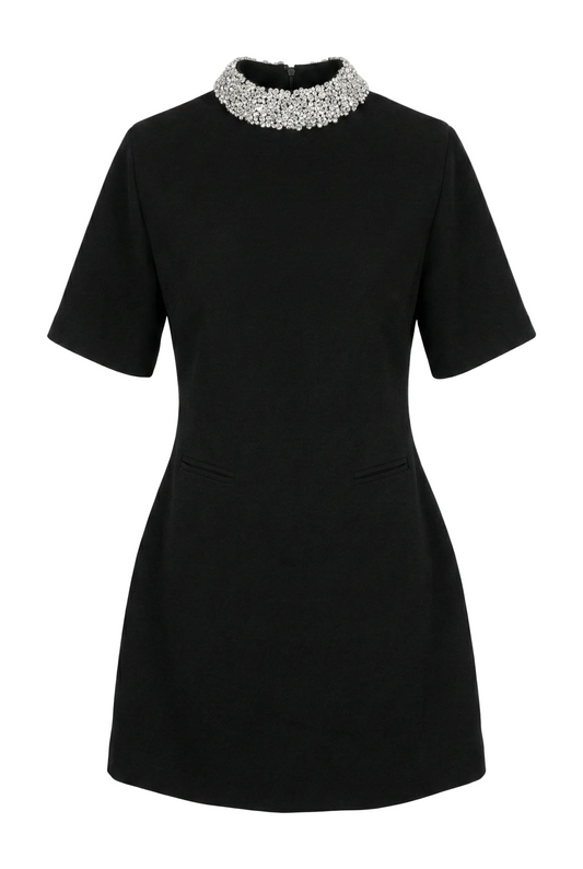 Black dress with embellished collar on a white background