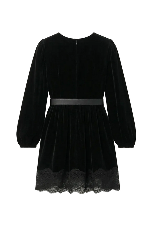 Black velvet dress with lace hem on a white background
