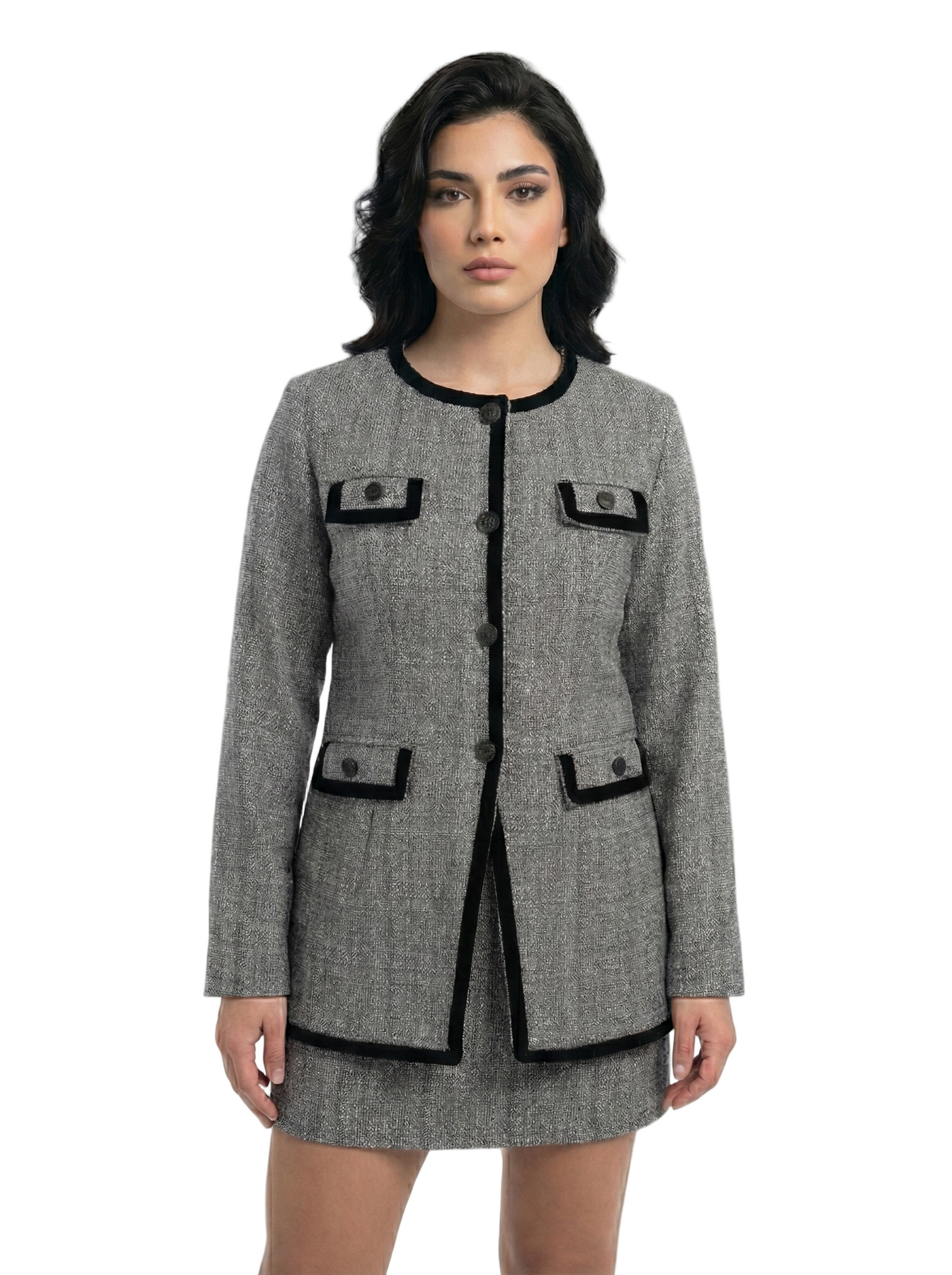 Woman wearing a gray coat with black accents on a white background