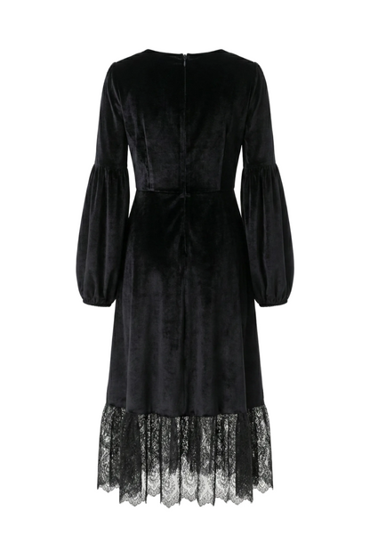 Black dress with lace hem on a white background