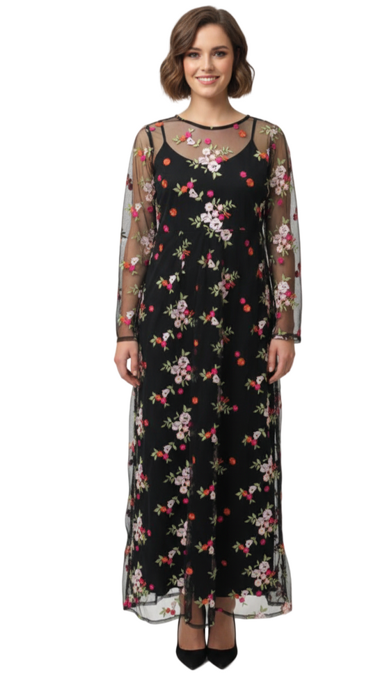 Woman wearing a black floral dress on a white background