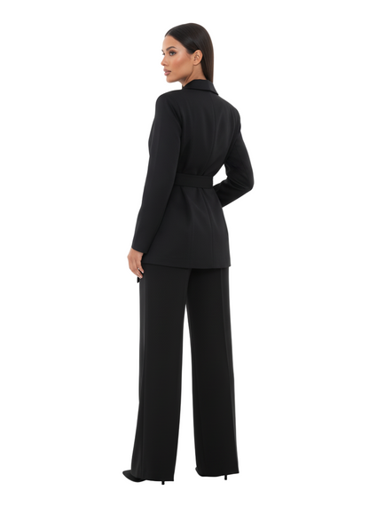 Woman wearing a black suit on a white background