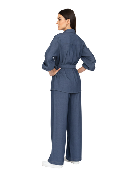 Woman wearing a blue outfit on a white background